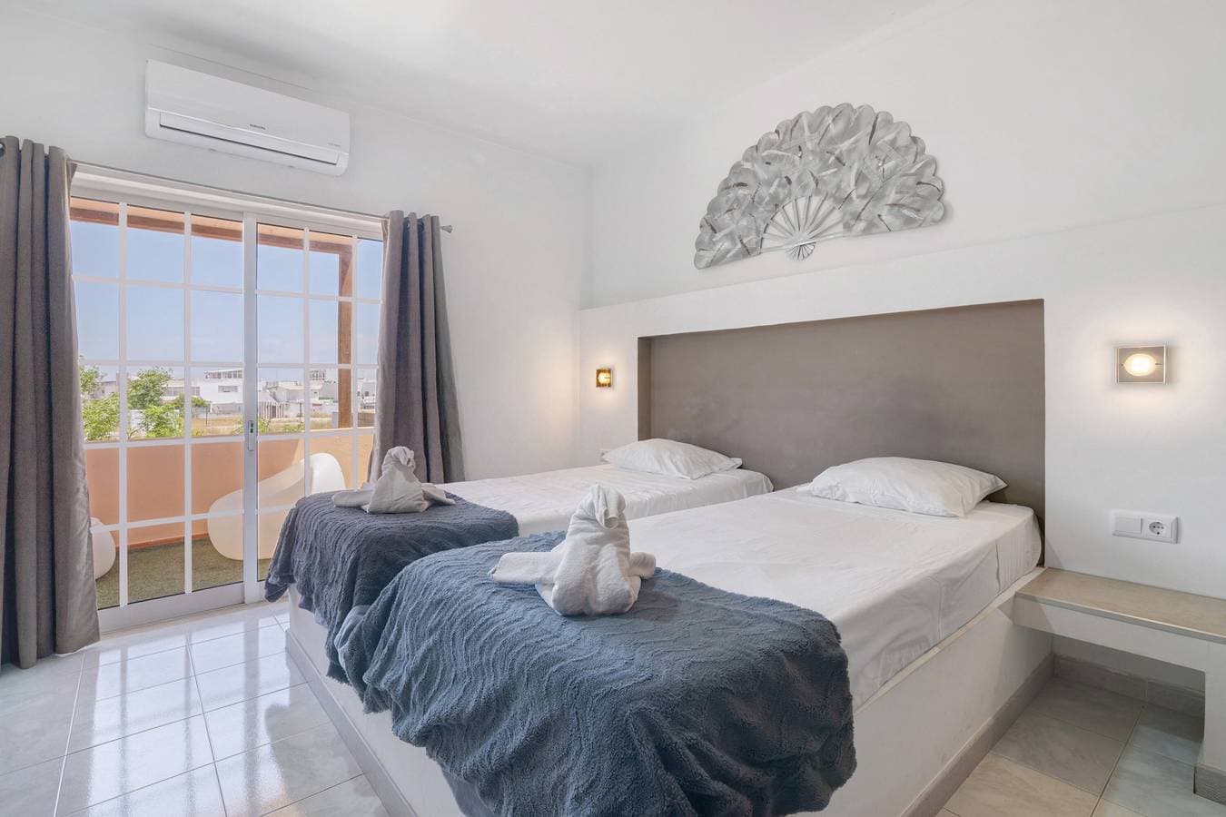 Foto 4 von 22: Zimmer 'South Side Guesthouse - Quarto E' mit Gemeinschaftspool, WLAN und Klimaanlage