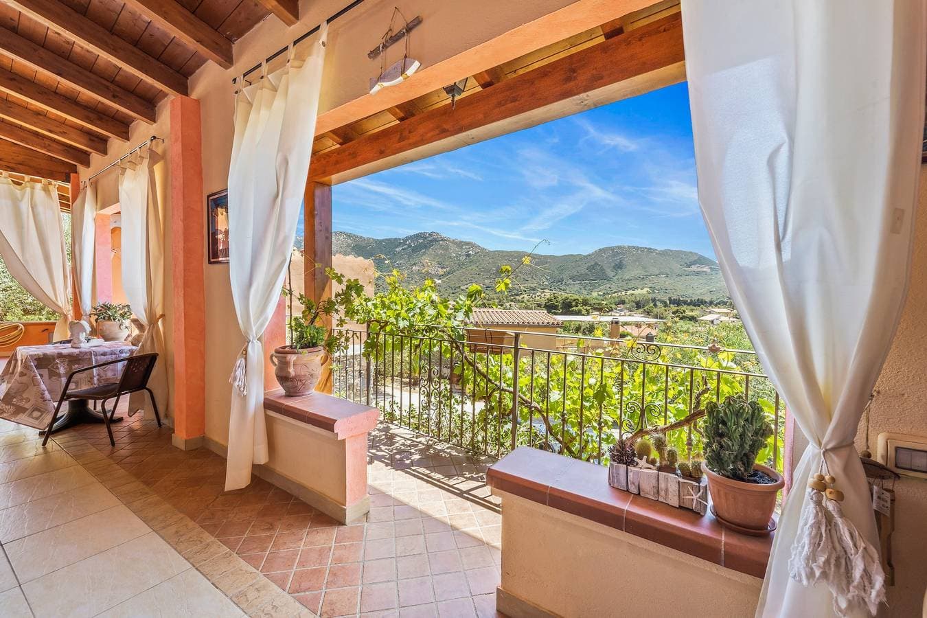 Foto 3 von 25: Ferienhaus 'Villetta Degli Oleandri' mit Meerblick, privater Terrasse und Klimaanlage