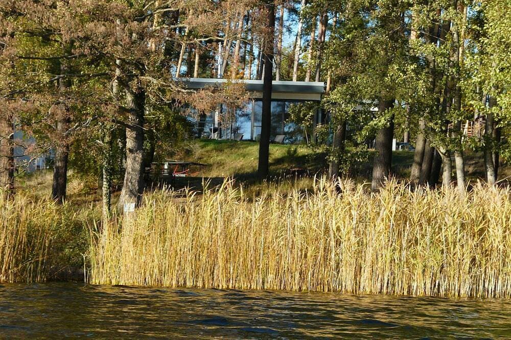 Foto 12 von 29: Luxus-Ferienhaus direkt am See, naturnaher Komfort in modernem Stil