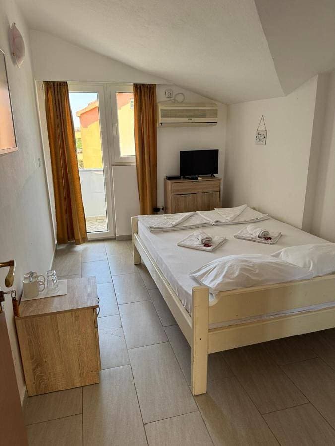 Foto 2 von 14: Triple Room with Terrace