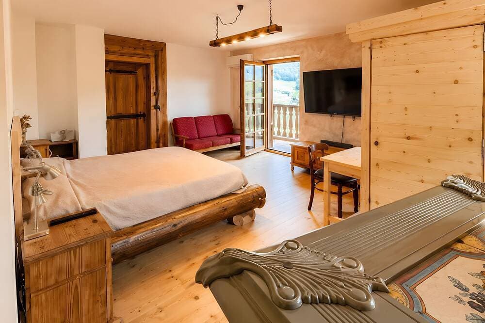 Foto 3 von 25: Zimmer „Camera Stella Alpina“ mit Bergblick, WLAN und Klimaanlage