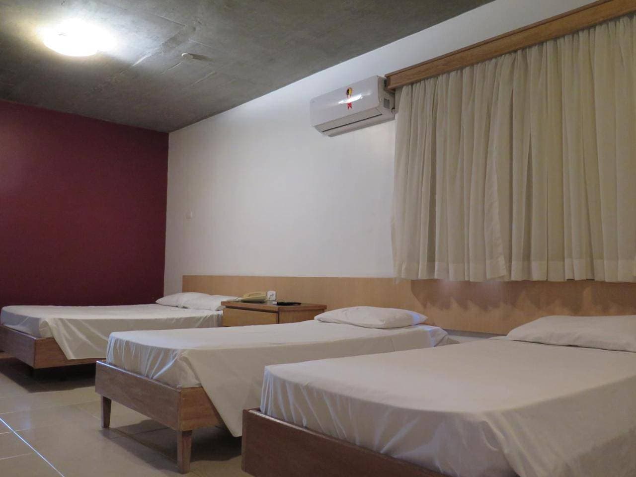 Foto 8 von 10: Quadruple Room