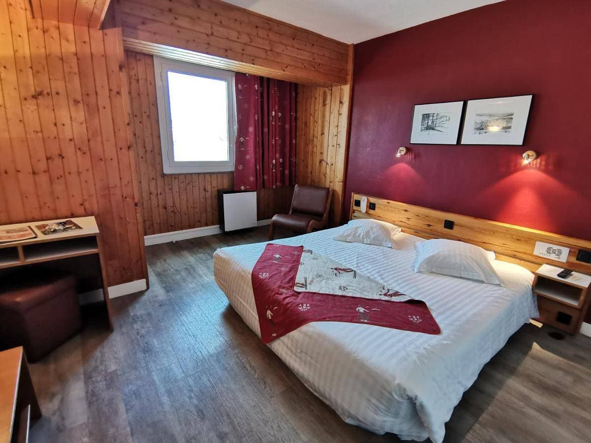 Foto 2 von 9: Quadruple Room