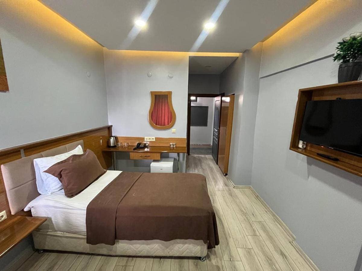 Foto 2 von 13: Basic Triple Room