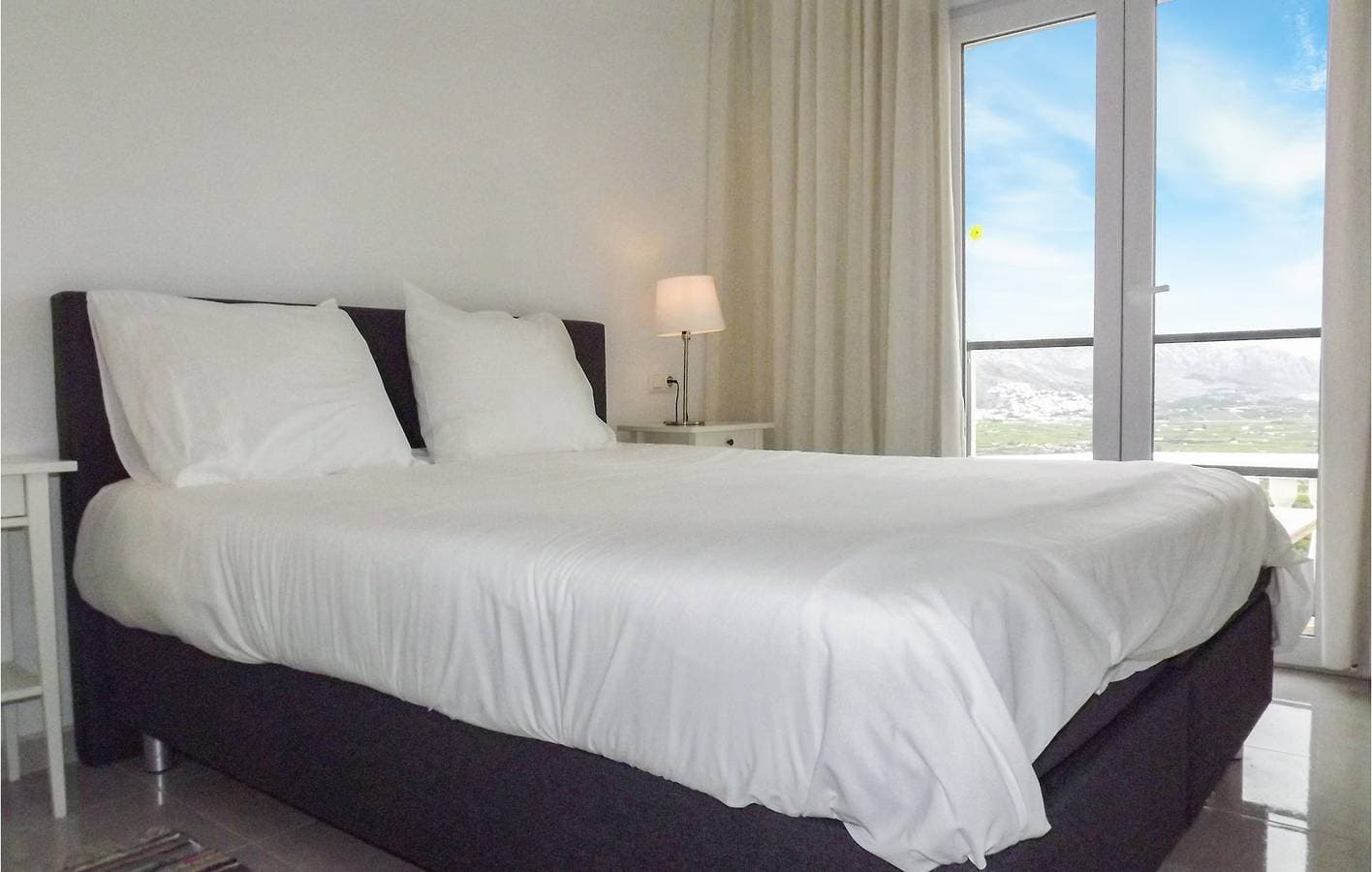 Foto 10 von 23: Meerblick 2BR Apartment mit Parkplatz & Pool in Orba