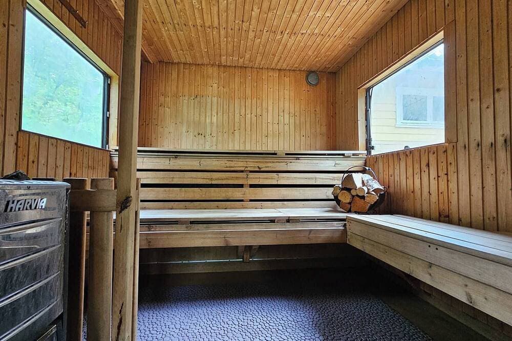 Foto 7 von 19: Ferienhaus, Private Sauna für 8 Personen and Garten