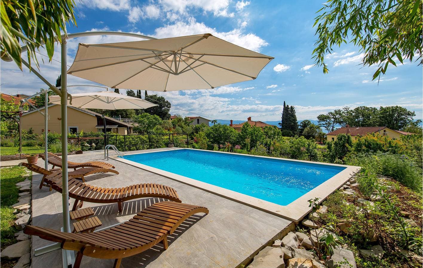 Foto 10 von 39: Gemütliche Ferienwohnung mit Meerblick, Pool und Terrasse in der Nähe eines haustierfreundlichen Strandes