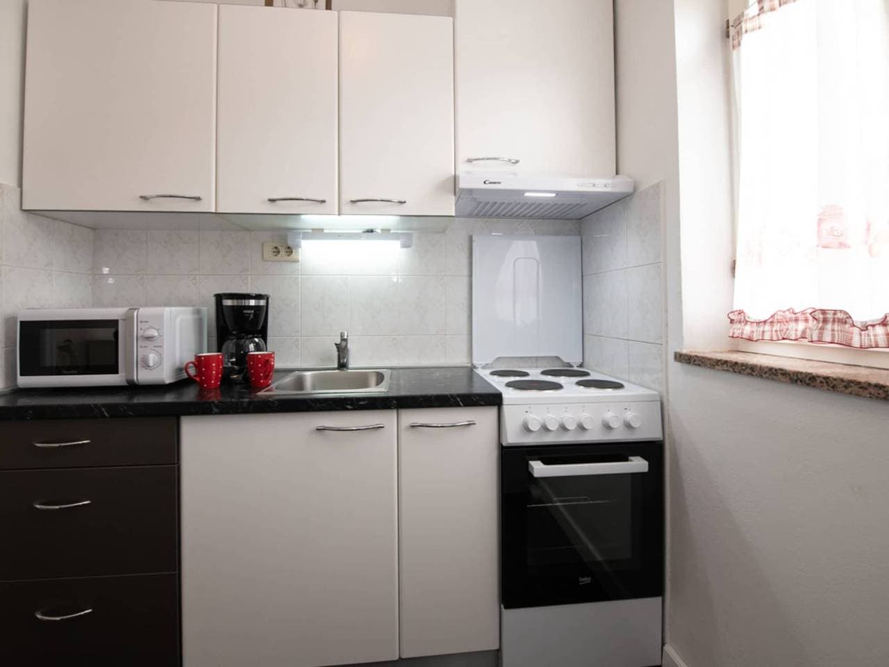 Foto 3 von 14: Studio Apartment With Balcony (A1)
