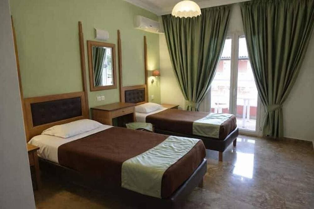 Foto 4 von 4: Cozy Coastal Hideaway at Irene Apartments – Steps from Agios Gordios Beach