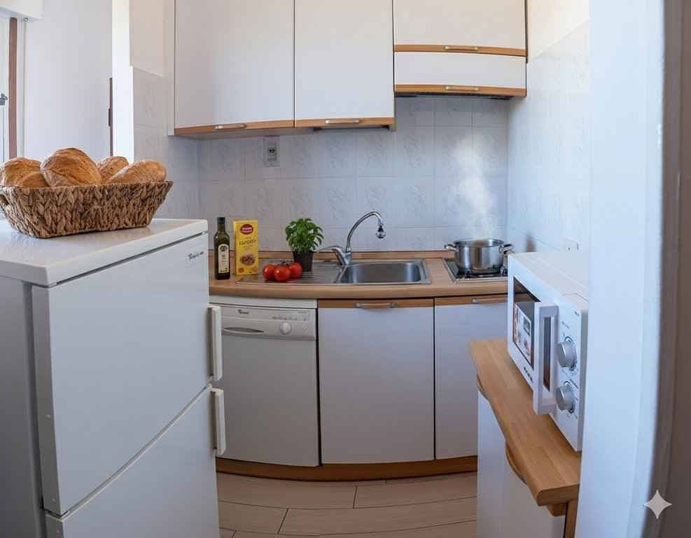 Foto 4 von 10: Ferienwohnung mit Klimaanlage und Balkon mit Meerblick
