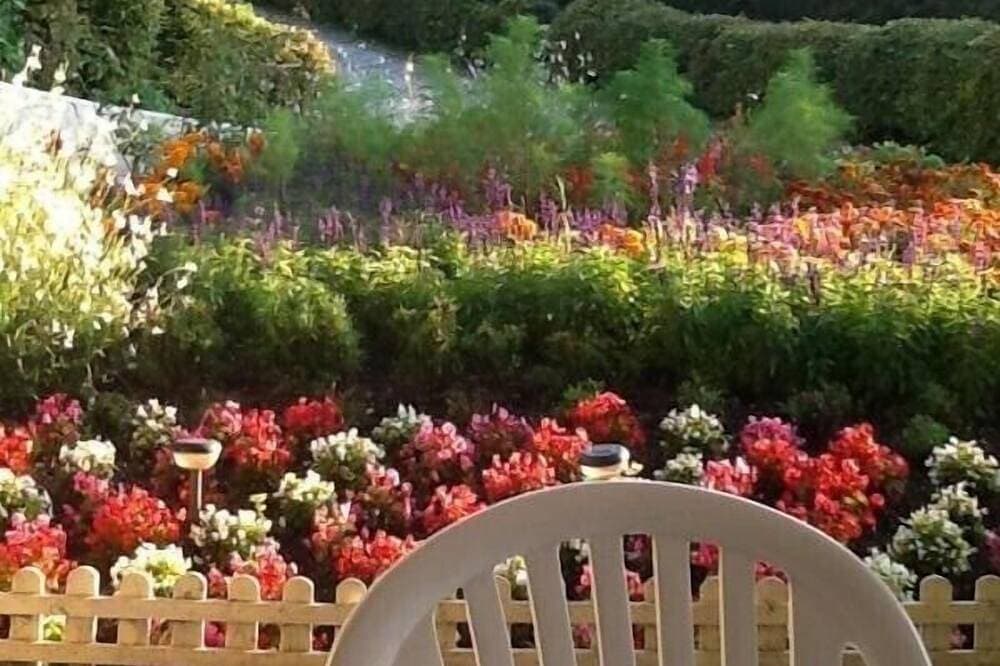 Foto 13 von 26: Au Jardin Fleuri - Le Montcel
