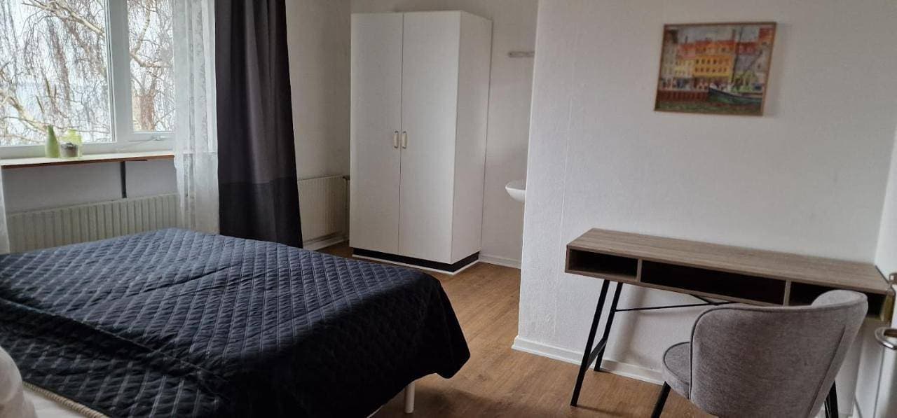 Foto 7 von 9: Double Room with Shared Bathroom