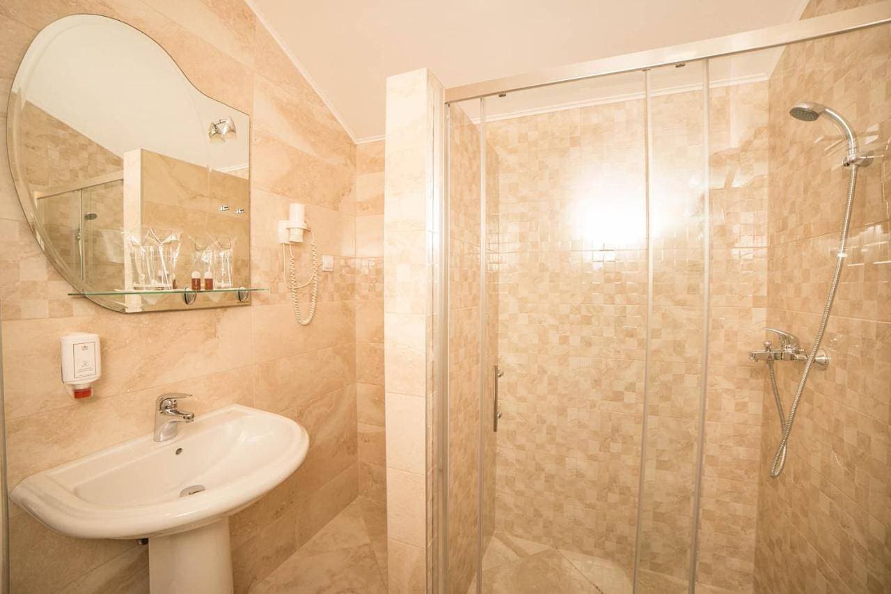 Foto 4 von 12: Quadruple Room with Sea View