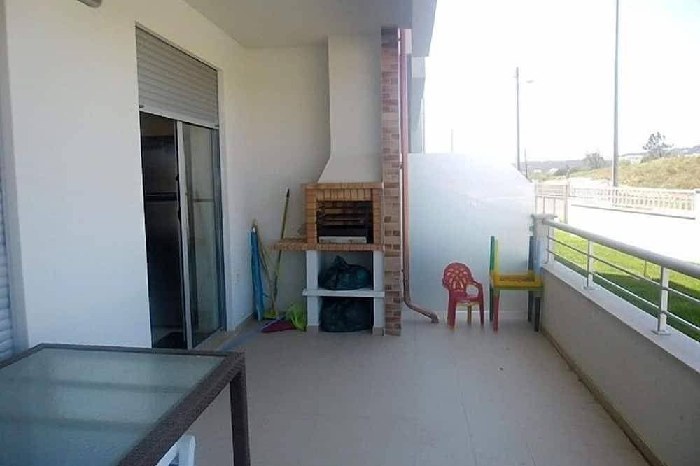 Foto 12 von 12: 2 Schlafzimmer Erdgeschoss moderne Wohnung mit erweitertem Balkon und eigenem Grill