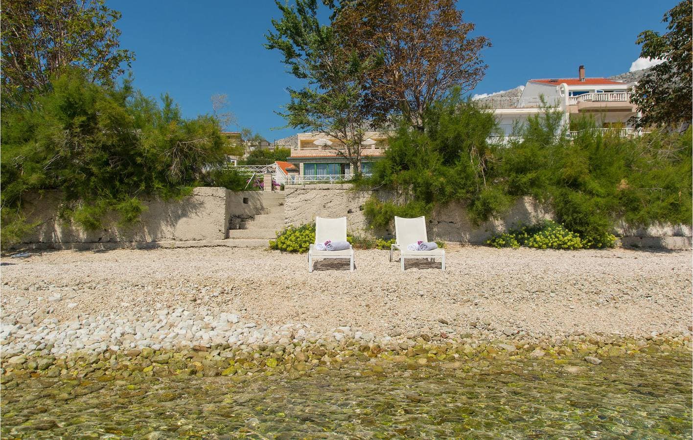 Foto 10 von 26: Gemütliche 300 m zum Strand: Klimatisierte Wohnung mit Terrasse und Parkplatz