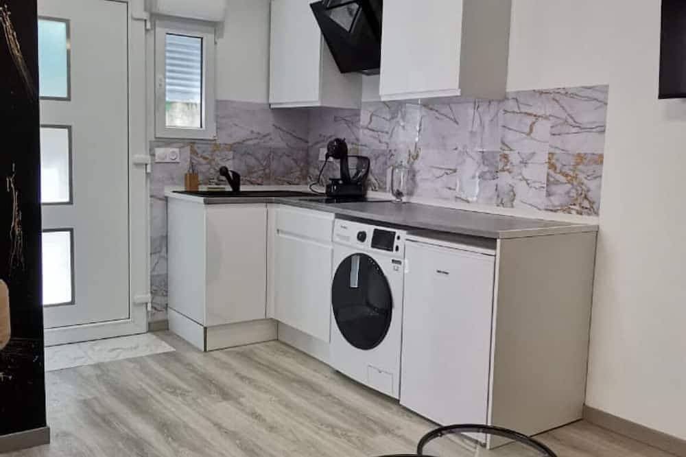 Foto 12 von 13: Maison Appartement Triplex Avec Jacuzzi et Sauna
