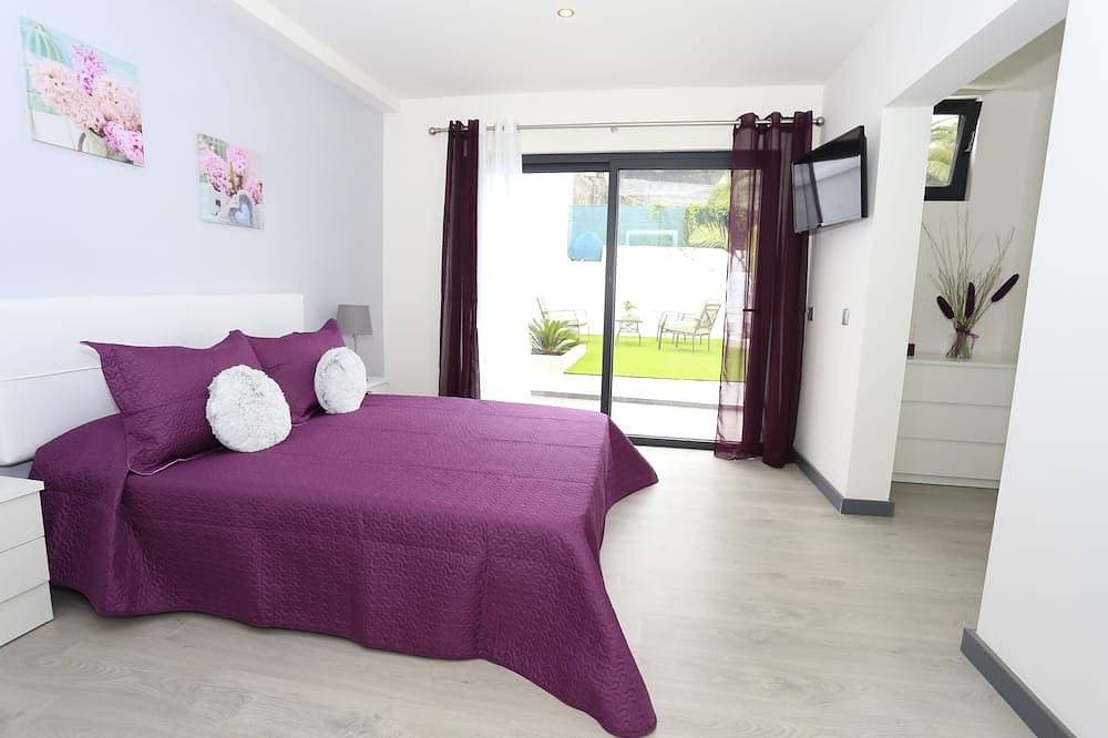 Foto 6 von 30: Einzelhaus mit 3 Schlafzimmern, 3 Bädern, Wohnzimmer, Küche, Garten