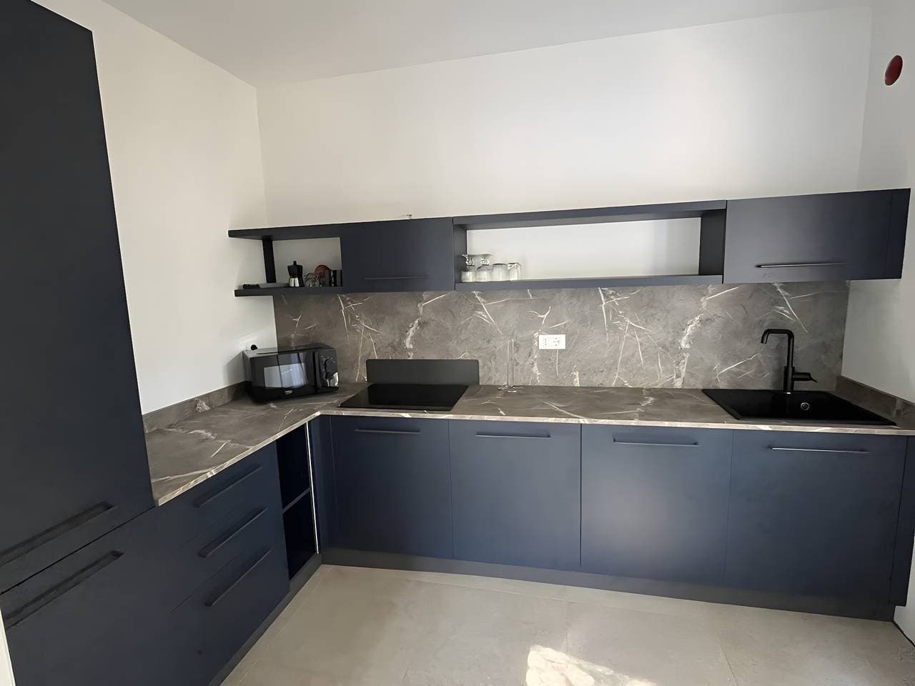 Foto 6 von 33: Apartment 'Il Casalino - Bilo 4' mit Bergblick, Gemeinschaftsgarten und Klimaanlage