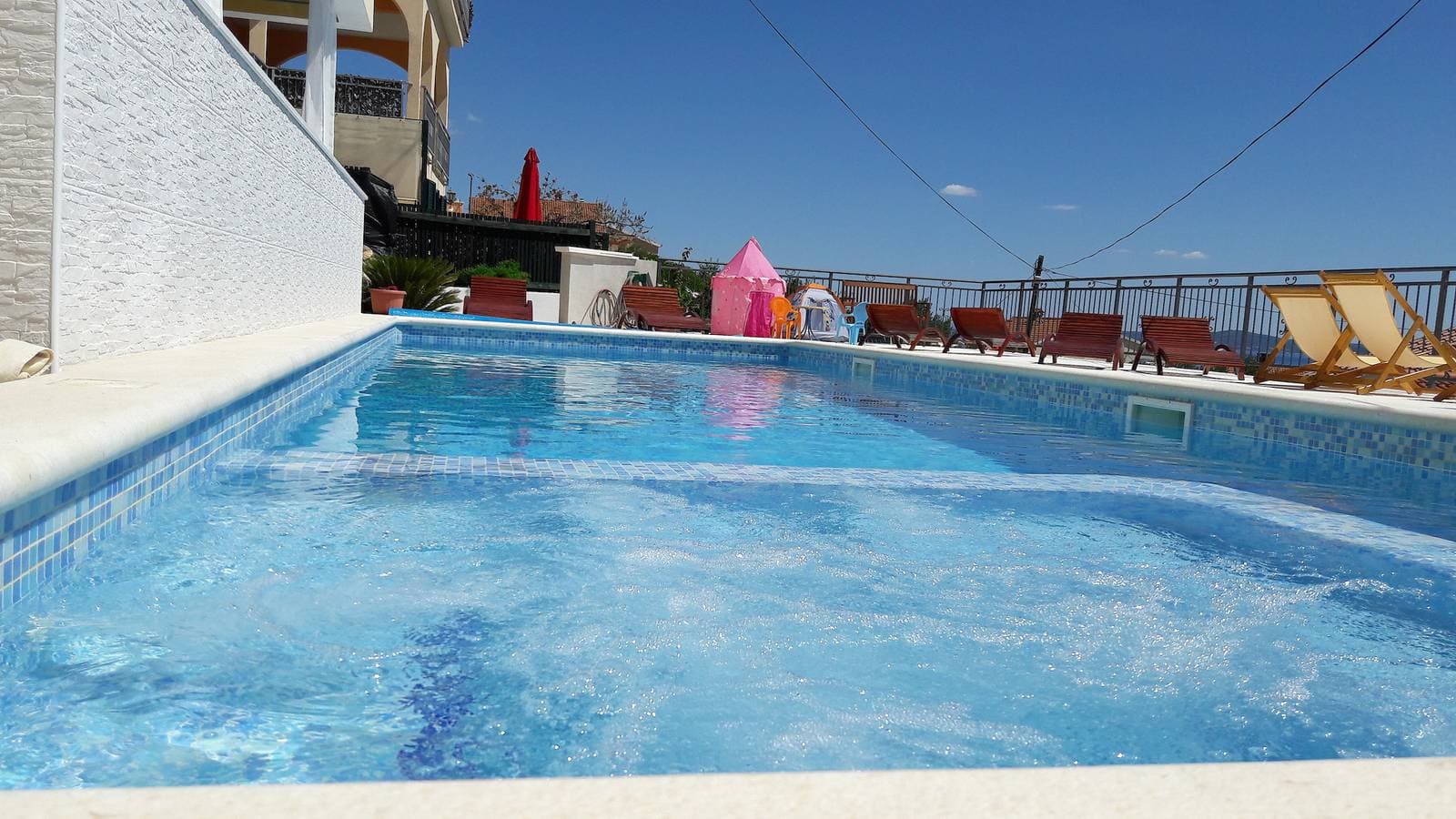 Foto 4 von 26: Apartment am Pool mit Meerblick und geräumigem Sonnendeck a5