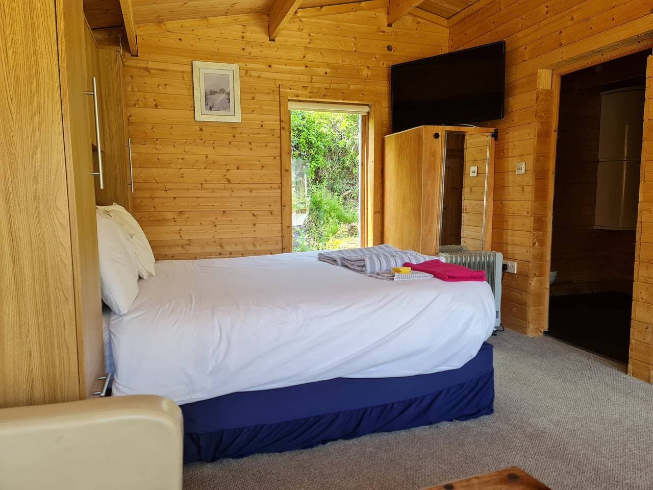 Foto 6 von 19: Blockhütte für 2 Personen mit Garten