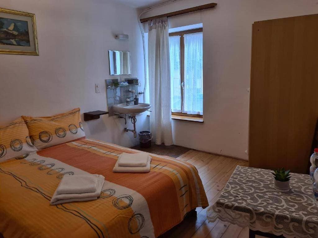 Foto 7 von 30: Triple Room with Balcony