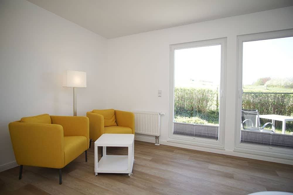 Foto 5 von 19: Ferienwohnung mit Terrasse in ruhiger Lage - Haus Südperd FeWo Dünenrose - Haus