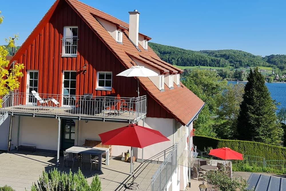 Ferienwohnung Hochparterre mit Seeblick 200m zum See 1