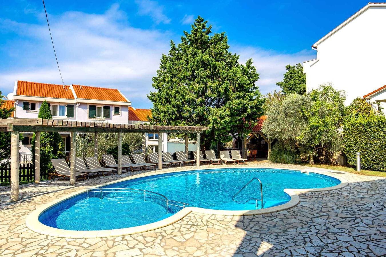 Foto 11 von 38: Ferienwohnung mit Pool