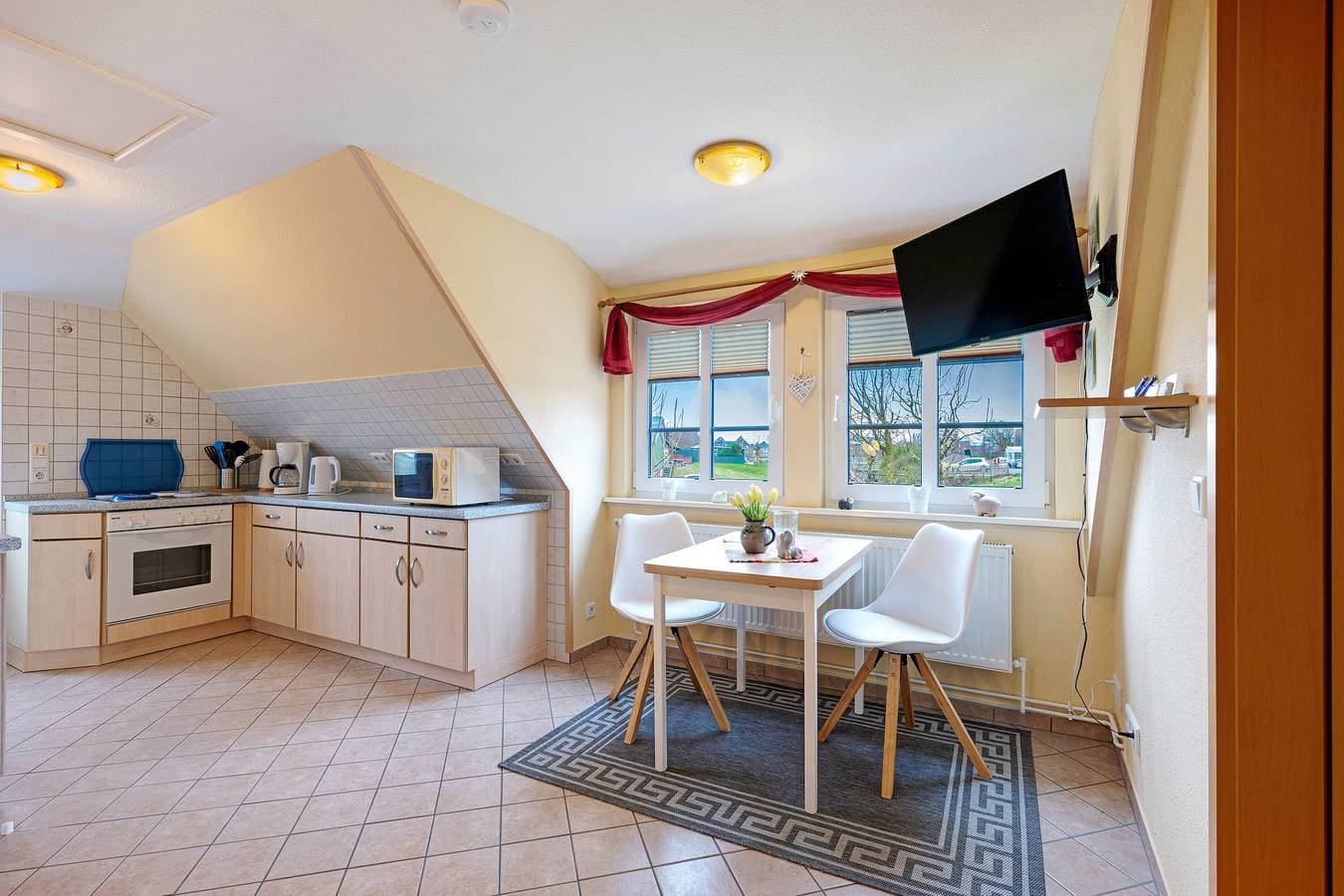 Foto 8 von 25: Ferienwohnung 'Ebbe Und Flut' mit Gemeinschaftsgarten und Balkon