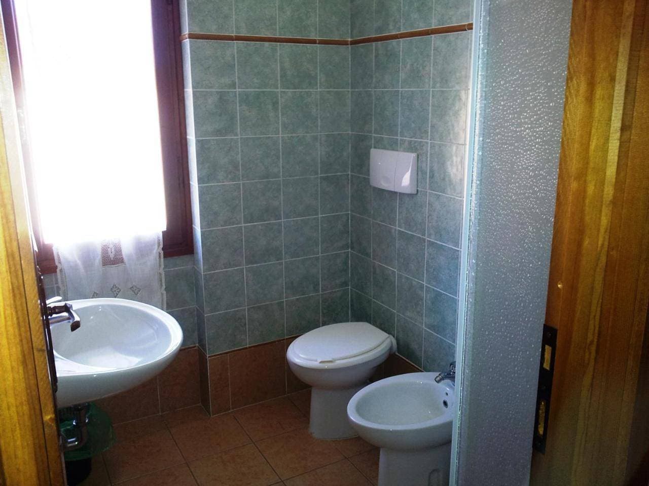 Foto 11 von 19: Quadruple Room with Garden View
