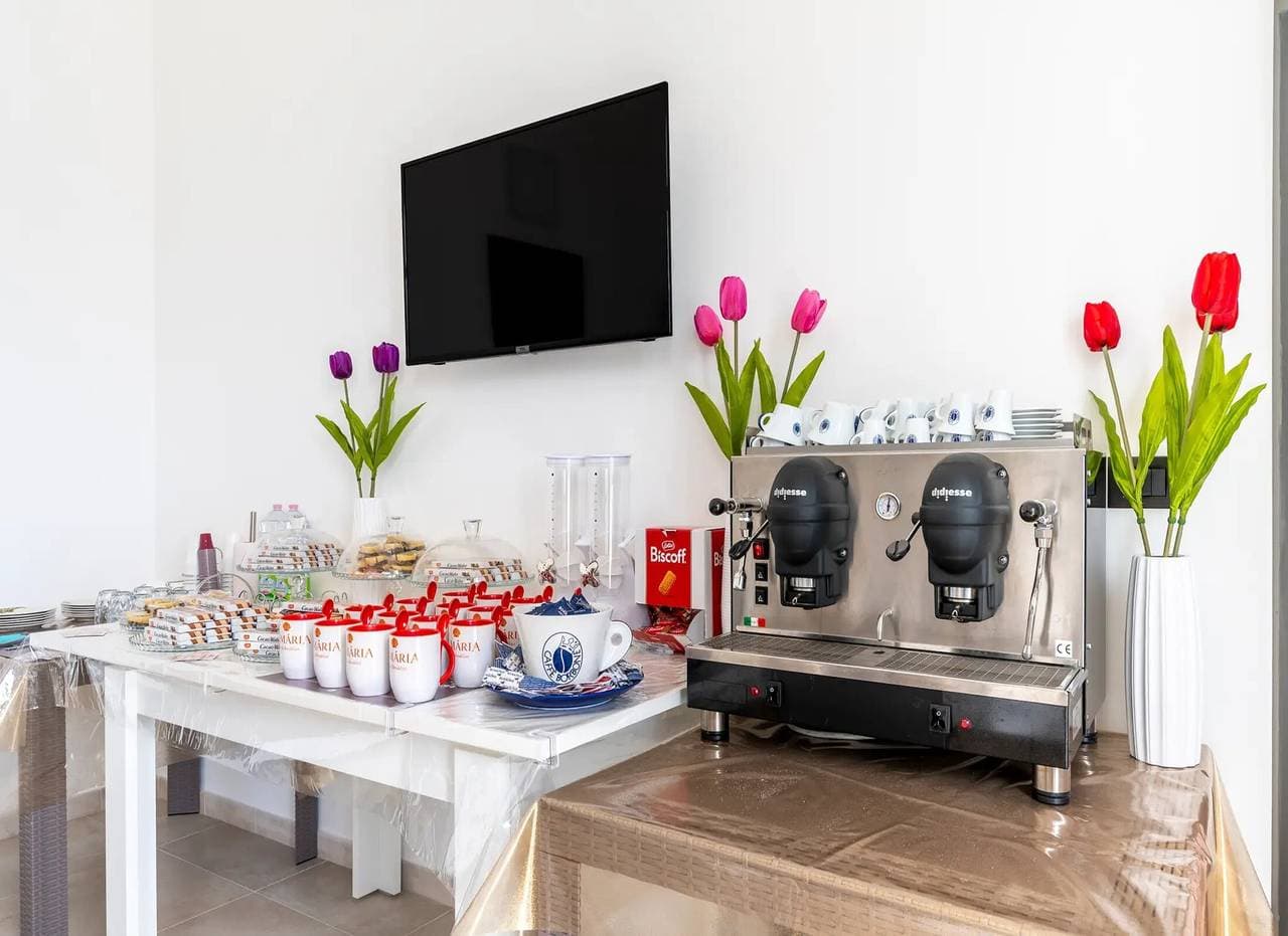 Foto 7 von 57: Zimmer "Aria - Dreibettzimmer" mit Gemeinschaftsgarten, WLAN und Klimaanlage
