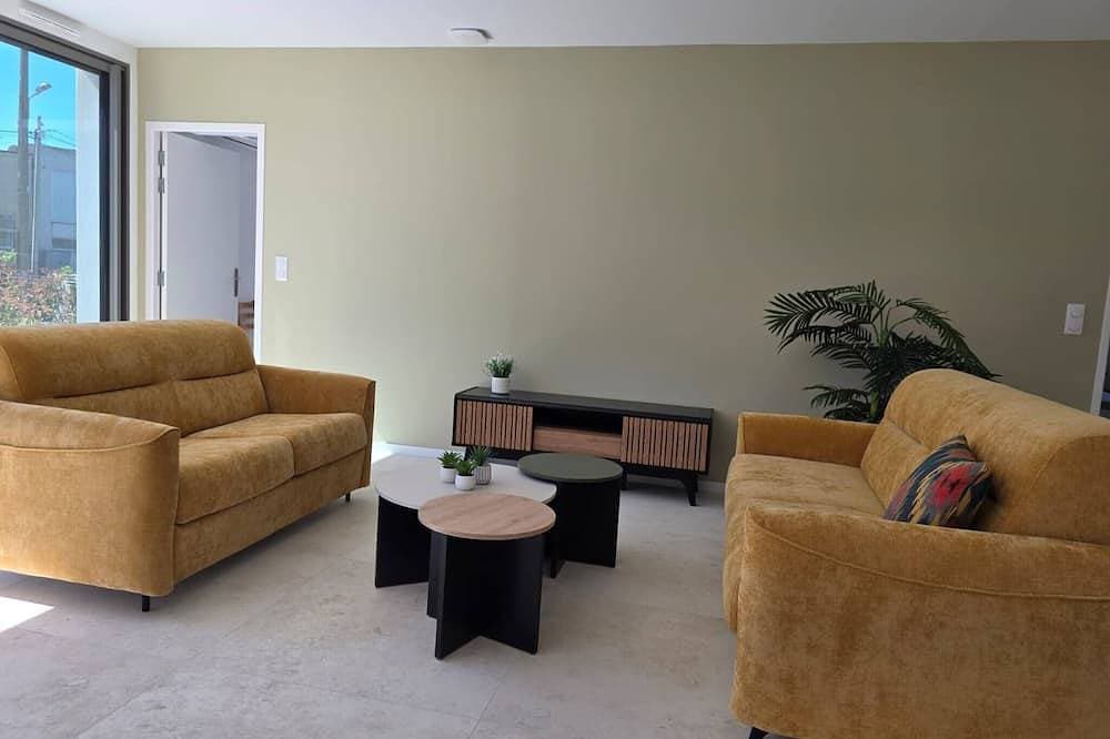Foto 13 von 20: Under the Palm Tree - Beach - Air Conditioning - Garden