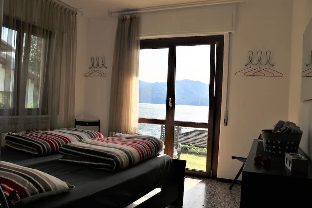Foto 4 von 21: Haus mit privatem Garten und herrlichem Seeblick
