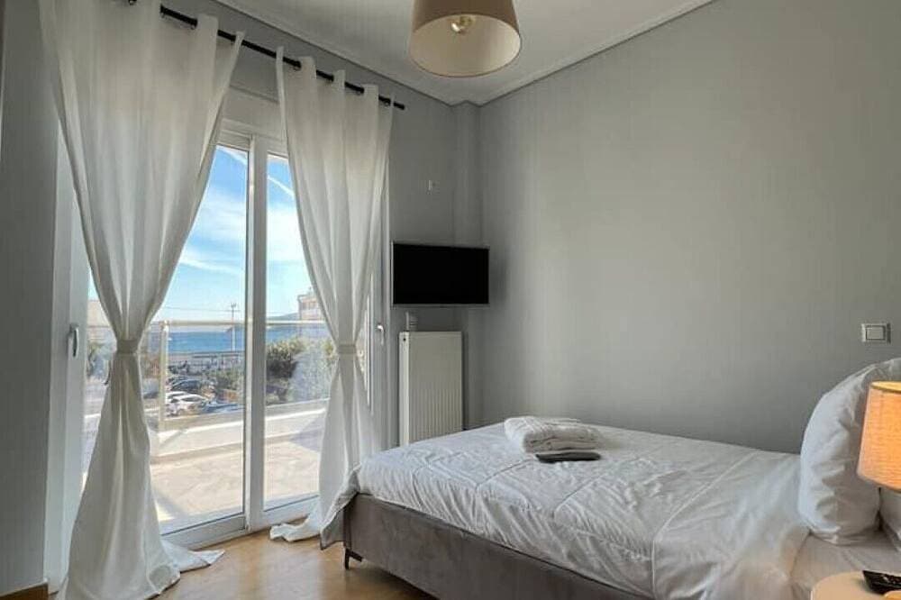 Foto 5 von 30: Allure Villa, beachfront, featuring a gym, sauna, and jacuzzi