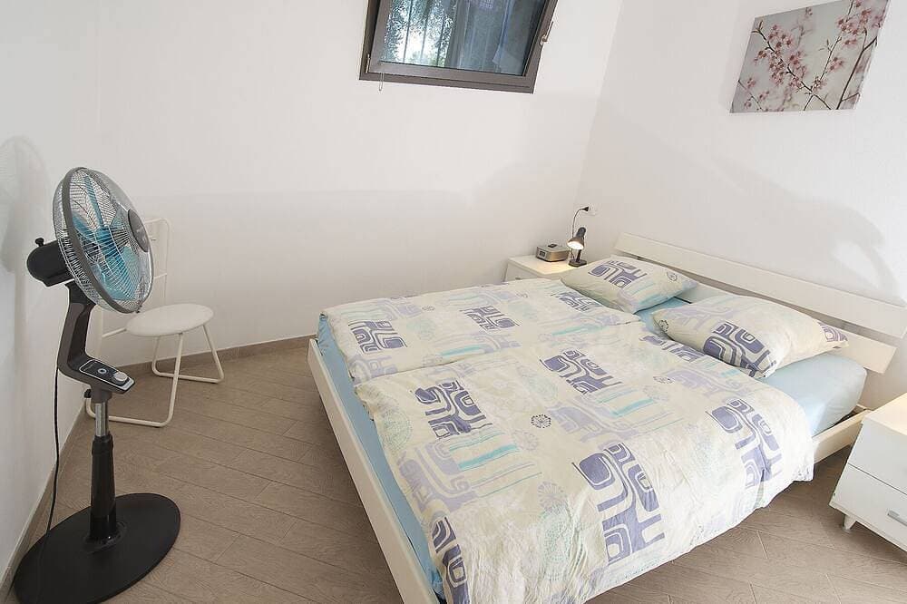Foto 5 von 23: FeWo Farfalla mit Klima, Pool und Parkplatz mit Ladestation 22 kw, 250 Meter See
