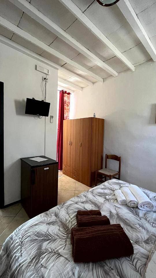 Foto 10 von 10: Double Room with Private Bathroom