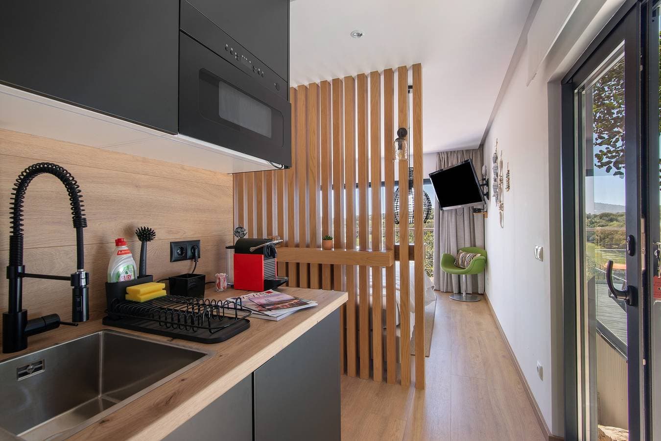 Foto 10 von 44: Ferienwohnung 'Tiny House' mit Bergblick, Wi-Fi und Klimaanlage