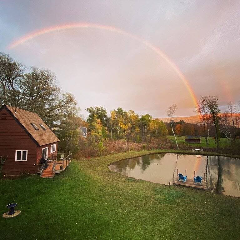 Home with a spring-fed pond and mountain view. 1