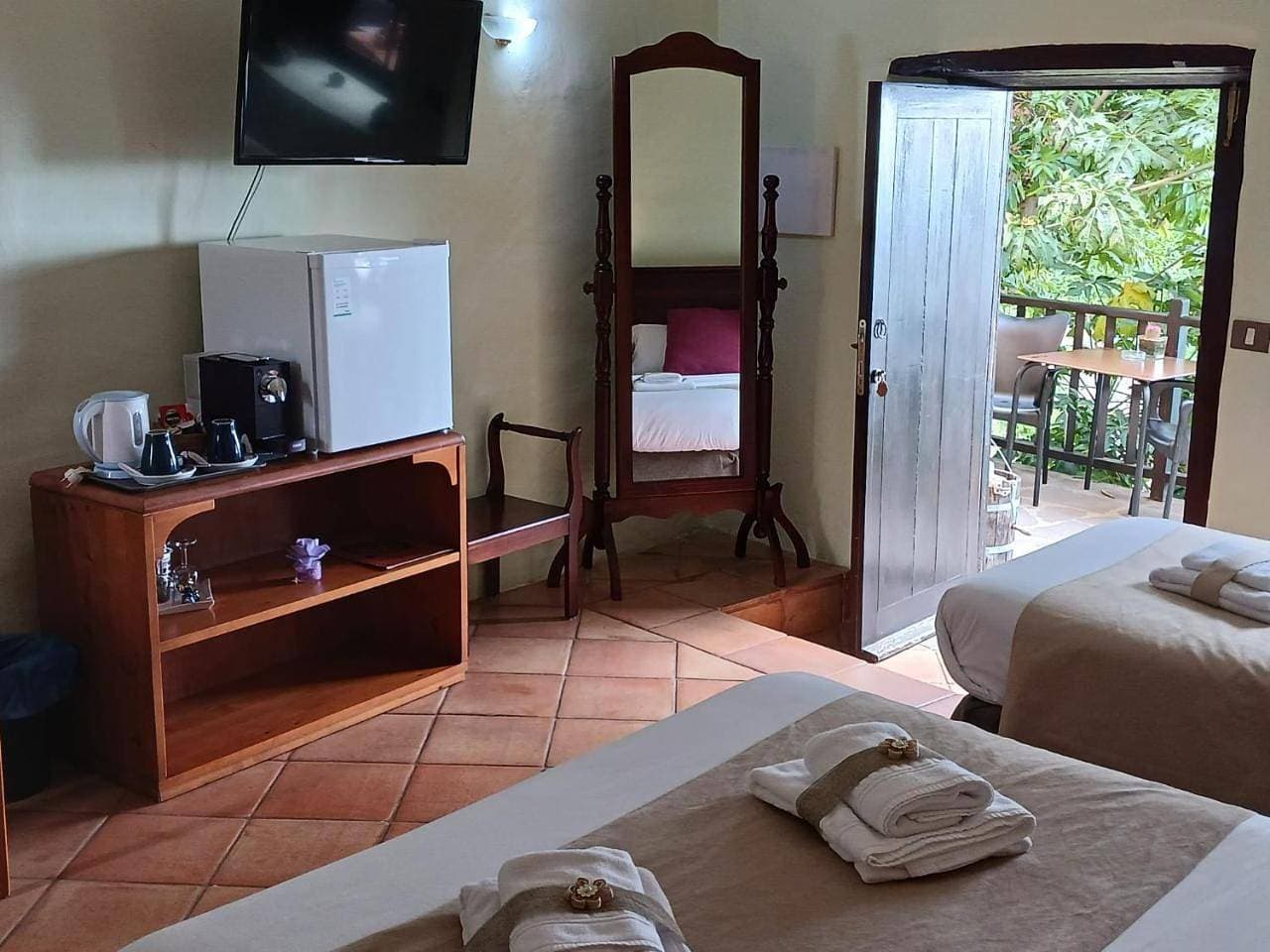 Foto 7 von 20: Twin Room with Private Bathroom