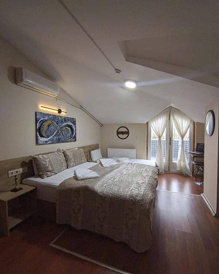 Foto 2 von 19: Deluxe Double Room with Side Sea View