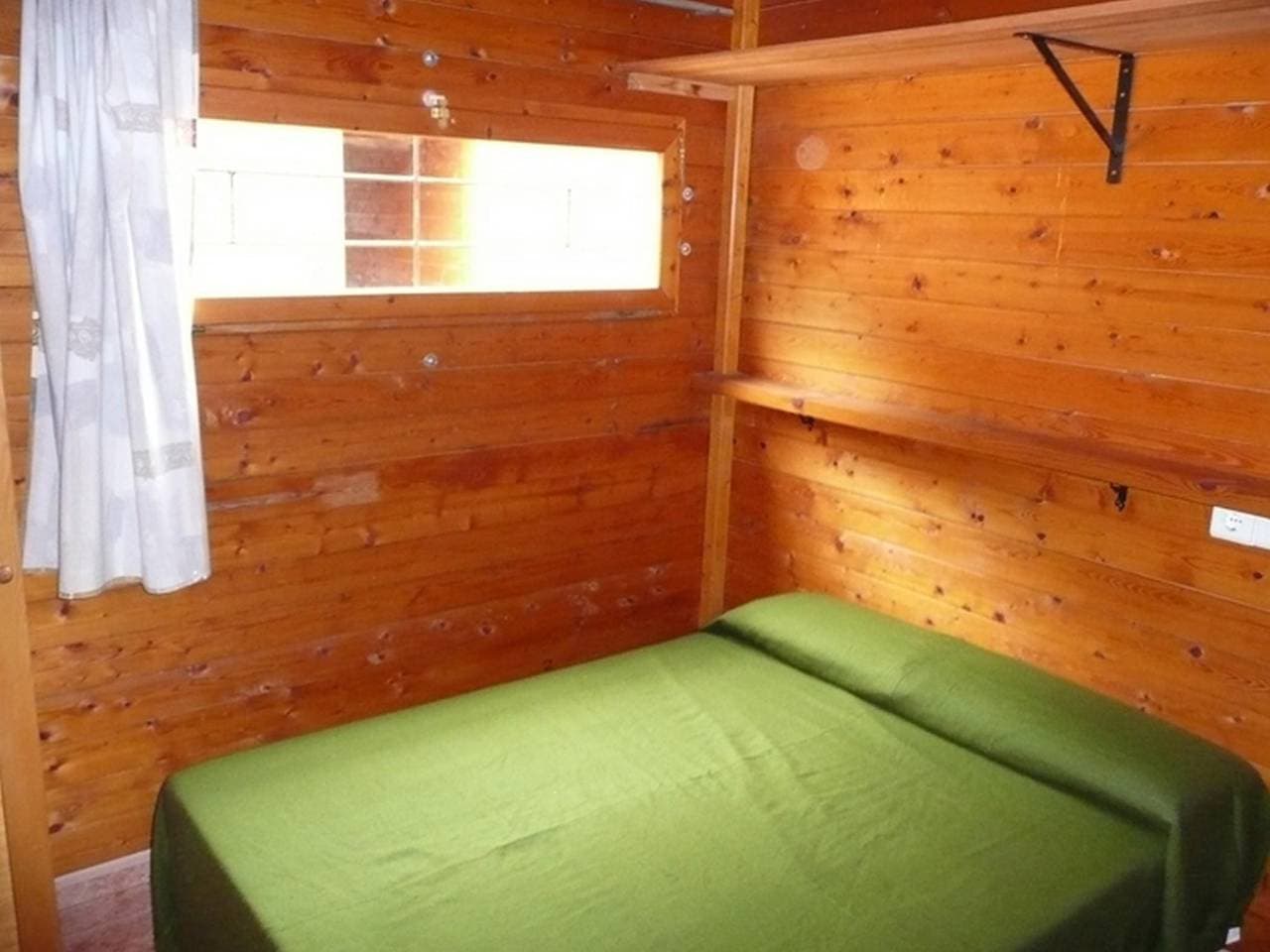 Foto 10 von 27: Bungalow für 3 Personen mit Pool