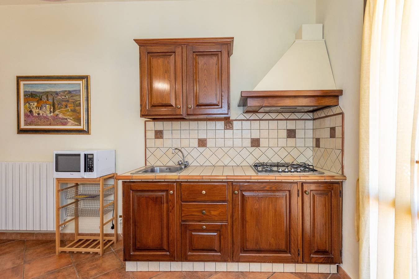 Foto 10 von 47: Apartment 'Viola' im Erdgeschoss mit Gemeinschaftspool und privatem Außenbereich