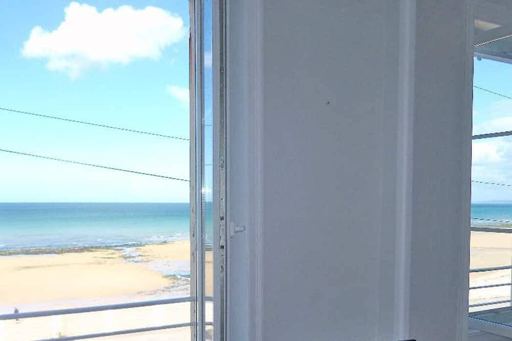 Foto 7 von 12: Votre escapade face à la mer — un appartement simple, à 20 mètres de la mer