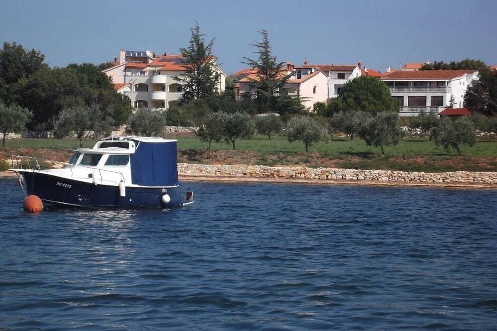 Foto 8 von 21: Klimatisierte Wohnung   250 m vom Strand mit eigenem Bootsliegeplaz
