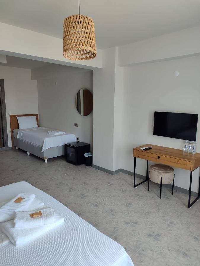 Foto 3 von 6: Triple Room