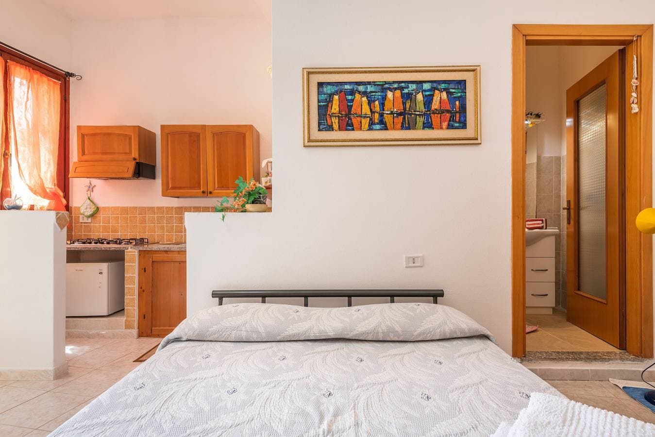 Foto 7 von 19: Ferienhaus 'Monolocale Il Girasole' in Stadtzentrumnähe mit Garten und Klimaanlage