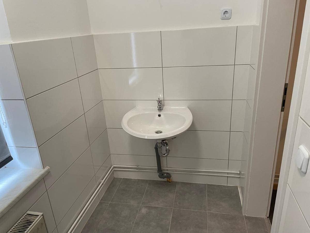 Foto 3 von 25: Triple Room with Private Bathroom