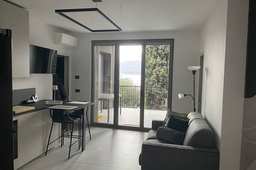 Foto 11 von 30: 3 Zimmer Apartment am  Gardasee mit traumhaften Seeblick und Pool in Torri