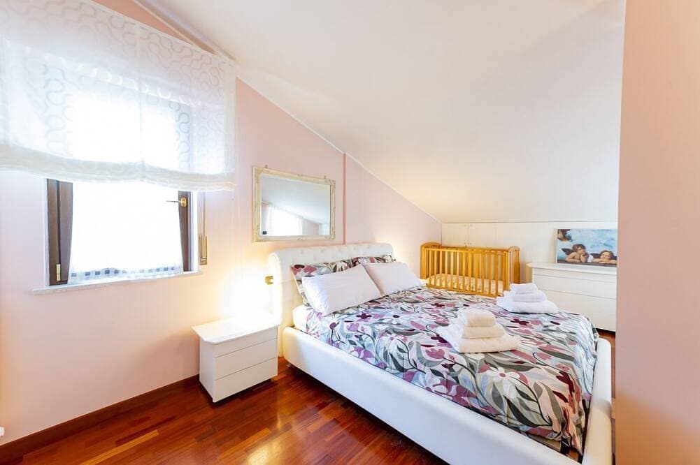Foto 4 von 30: GuestHost - Nice 80 sqm apartment on two levels, perfect for 2 people, located on the first floor of a semi-detached house Without a lift (stairs to access it). The accommodation is located in San Martino, a quiet and peaceful neighborhood where you can