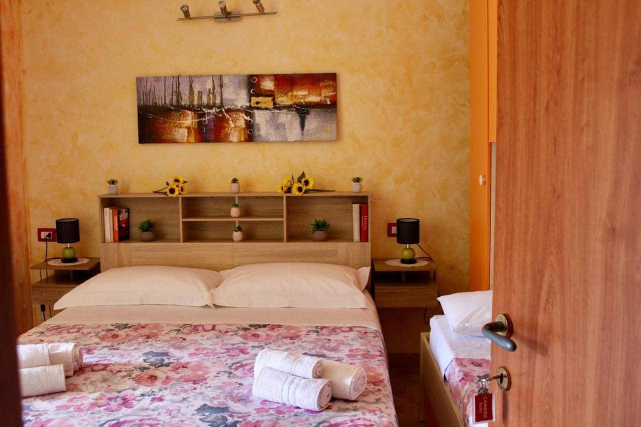 Foto 7 von 15: Triple Room with Private Bathroom